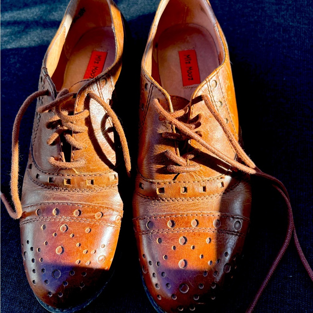 Miz Mooz Woman’s brown leather dress shoes.